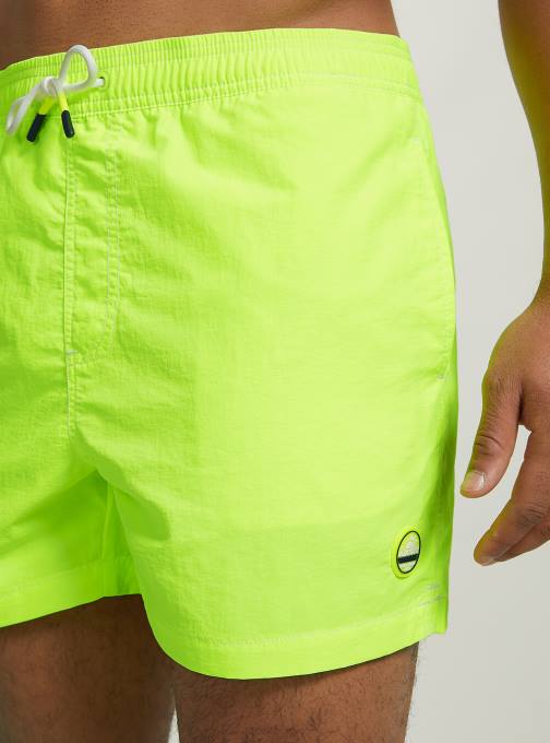 Heren Alcott fgn3 fluo lichtgroen zwemkostuum met borduursel en achterzak kleding PT24724