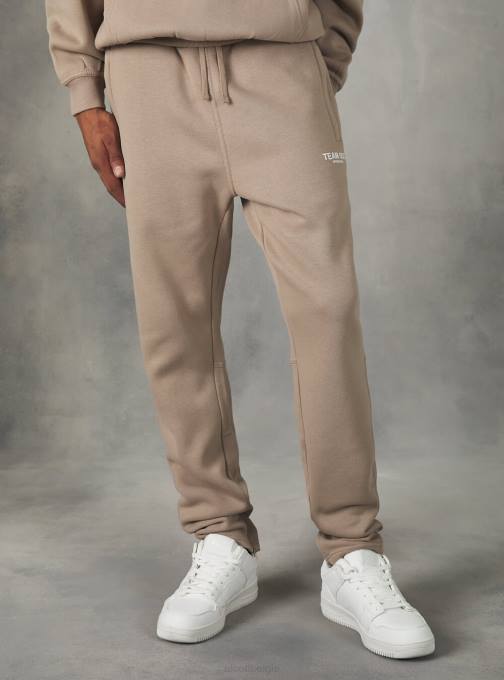 Heren Alcott bg1 beige donker joggingbroek met team 053 print kleding PT241174