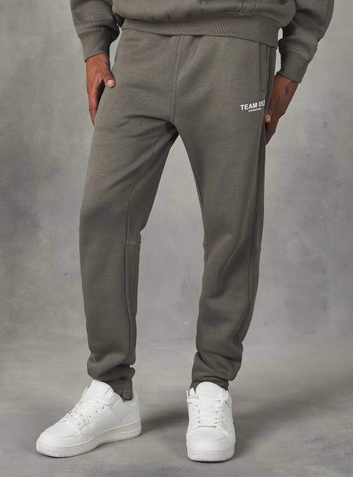 Heren Alcott bg1 beige donker joggingbroek met team 053 print kleding PT24769